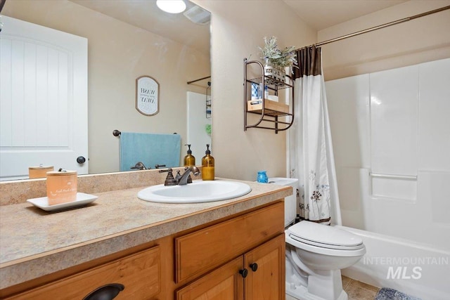 full bathroom featuring toilet, shower / tub combo, vanity, and tile patterned flooring