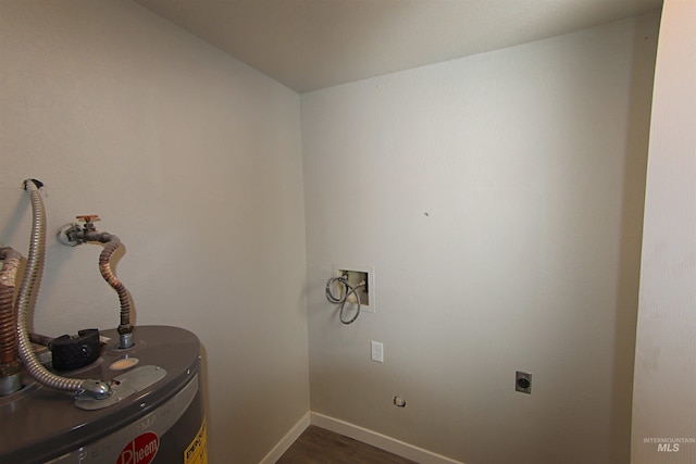 washroom featuring hookup for a washing machine, dark wood-type flooring, and electric dryer hookup