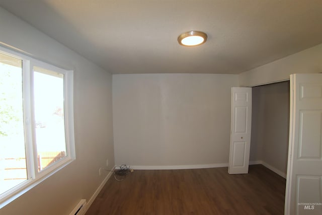 interior space with dark wood-type flooring