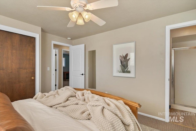 bedroom with carpet flooring, ceiling fan, and a closet