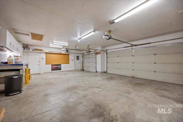 garage with a garage door opener