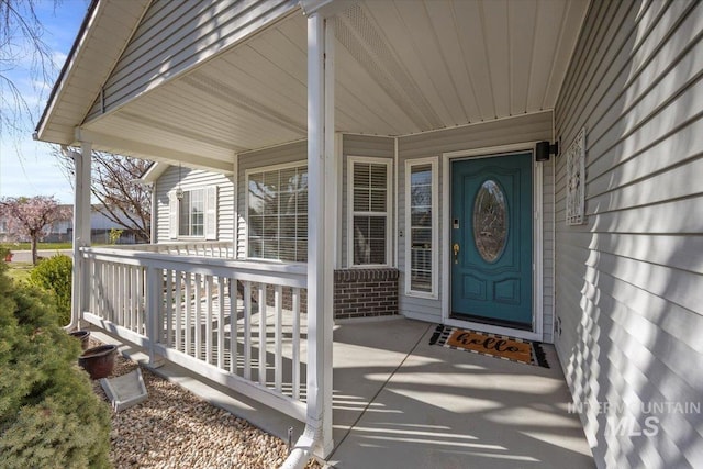 entrance to property with covered porch