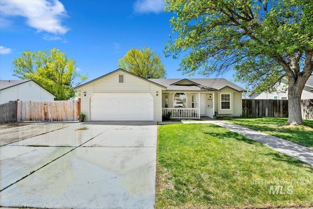 ranch-style home featuring a porch, a front yard, a garage, fence, and concrete driveway