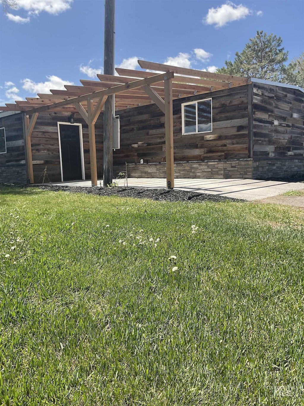2971N 3600 3600 E E, Kimberly, ID 83341 - rear view of property featuring a yard
