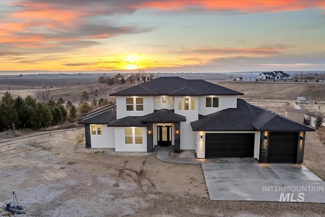 view of front of property with a garage