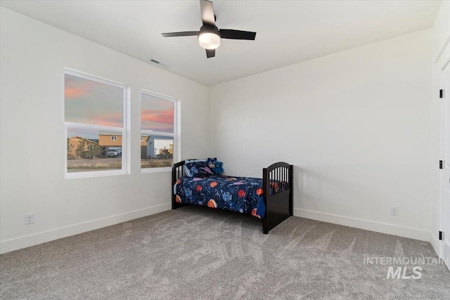bedroom featuring carpet floors and ceiling fan