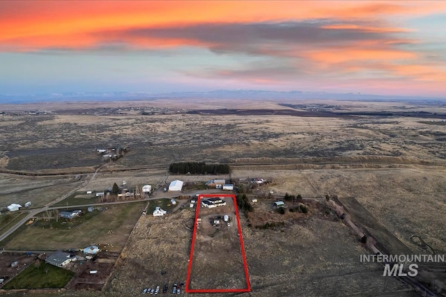 view of aerial view at dusk