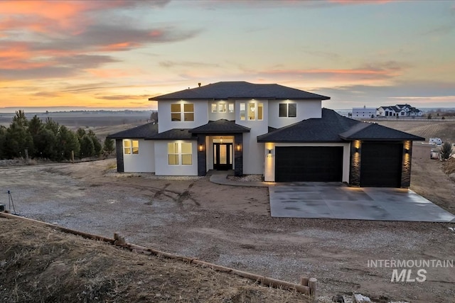 prairie-style home with a garage