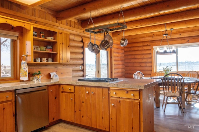 kitchen with a peninsula, brown cabinetry, light wood-style floors, and stainless steel appliances