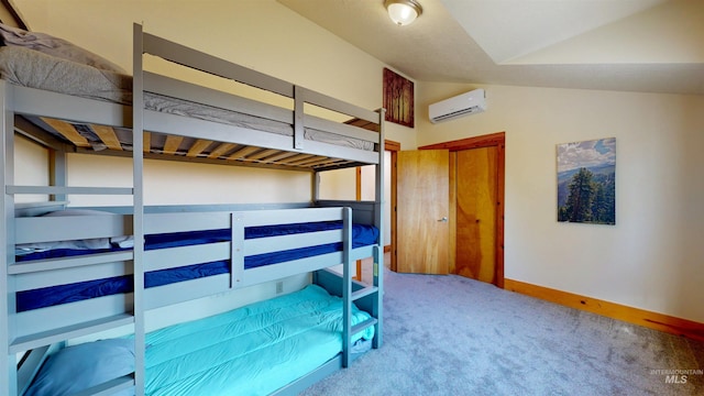 bedroom featuring baseboards, carpet, lofted ceiling, and a wall unit AC