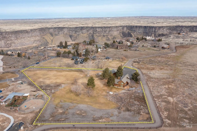 bird's eye view featuring a rural view and view of desert