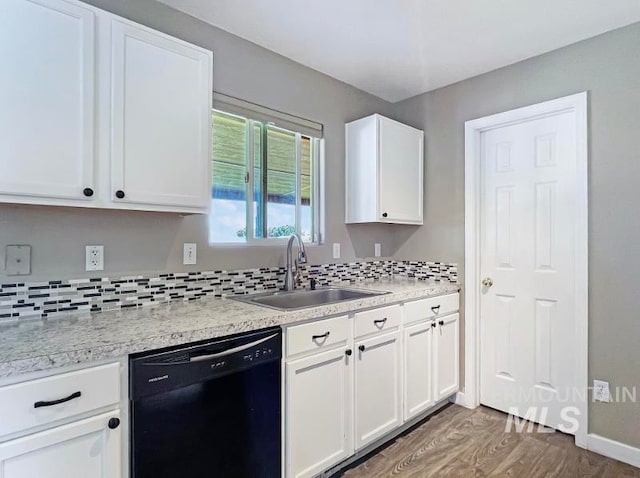 kitchen with dishwasher, dark wood-type flooring, backsplash, sink, and white cabinets