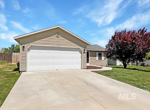 ranch-style home featuring a garage and a front yard