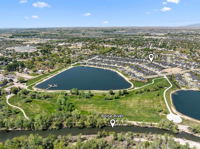 birds eye view of property featuring a water view
