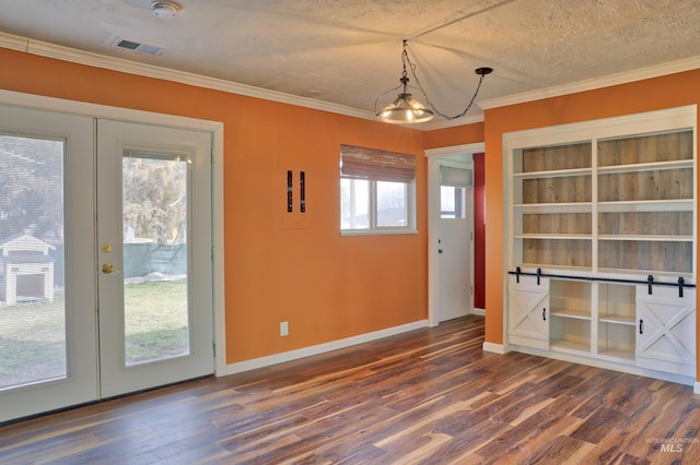 unfurnished dining area with crown molding, visible vents, dark wood-style flooring, and baseboards