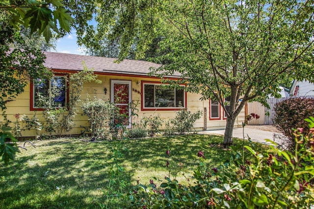 view of front of home with a front yard