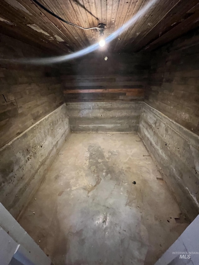 basement featuring wood ceiling