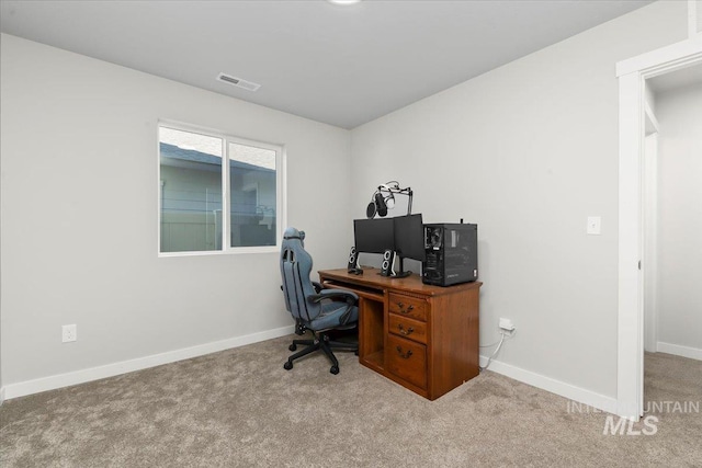 view of carpeted office space