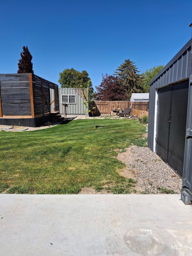 2545 Eastgate Dr, Twin Falls, ID 83301 - view of yard with a storage unit and an outdoor structure