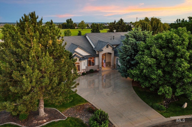 8585 W Rioja St, Star, ID 83669 - french country home with driveway and stucco siding