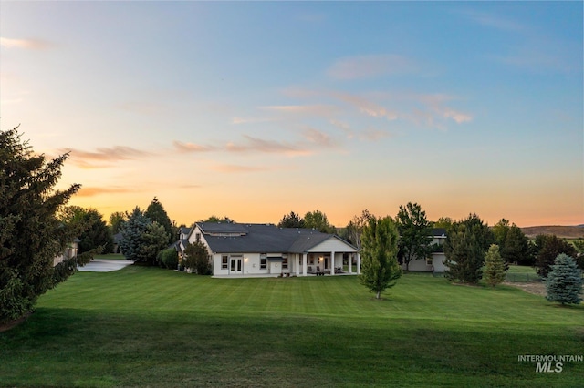8585 W Rioja St, Star, ID 83669 - view of front facade with a yard