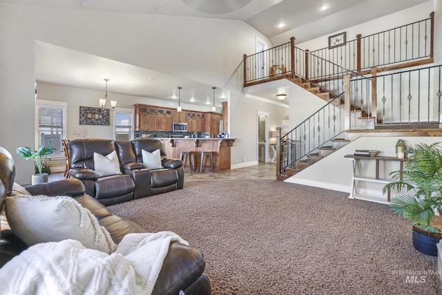 carpeted living room with vaulted ceiling