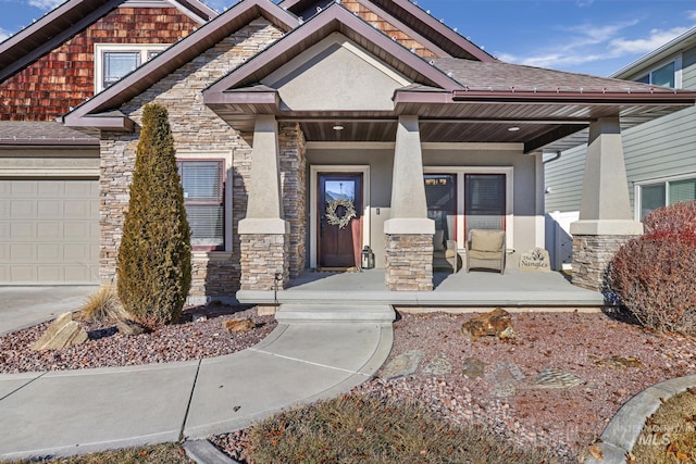 view of front of property with a garage and a porch