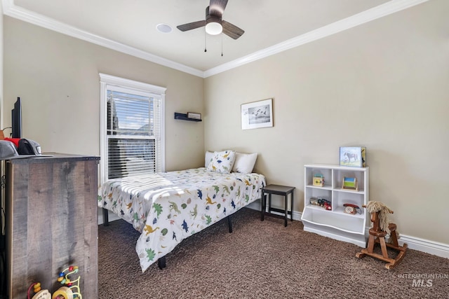 carpeted bedroom featuring ceiling fan and crown molding