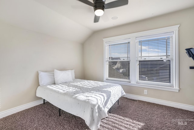 carpeted bedroom with lofted ceiling and ceiling fan