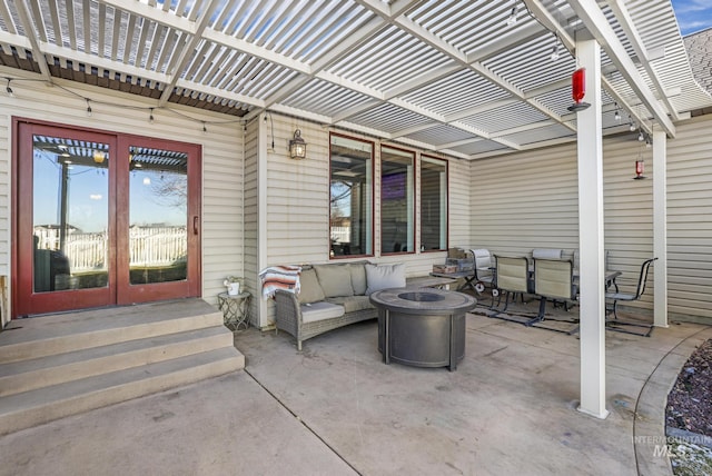 view of patio featuring an outdoor living space with a fire pit, a pergola, and french doors