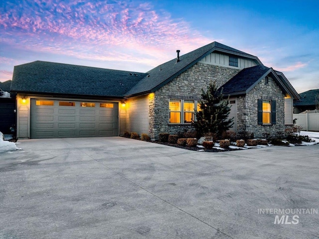 view of front of property with a garage