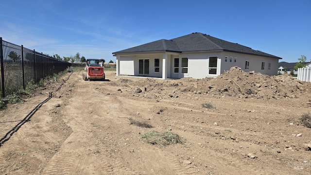 5728 S Keyport Way, Meridian, ID 83642 - rear view of house featuring dirt driveway