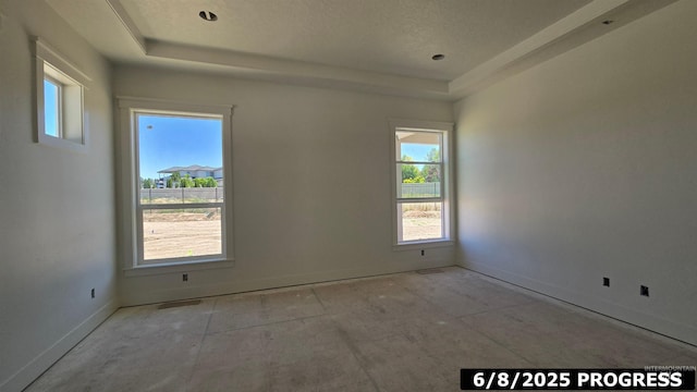 5728 S Keyport Way, Meridian, ID 83642 - spare room with a raised ceiling, healthy amount of natural light, and baseboards