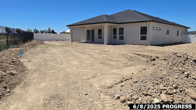 5728 S Keyport Way, Meridian, ID 83642 - back of house featuring a fenced backyard and stucco siding