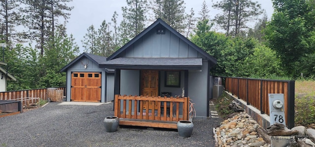 159 Chief Looking Glass Ln, Kamiah, ID 83536 - view of front facade featuring board and batten siding, fence, and a shingled roof
