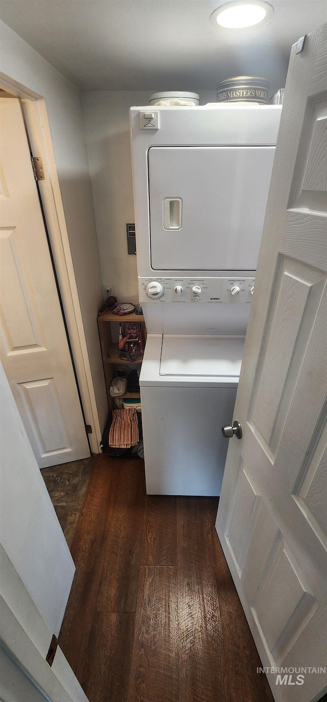159 Chief Looking Glass Ln, Kamiah, ID 83536 - washroom with stacked washer and clothes dryer and wood finished floors