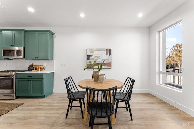 357 E Lombard Ln The Dayton, Unit The Dayton, Eagle, ID 83616 - dining space featuring plenty of natural light, baseboards, light wood-style flooring, and recessed lighting