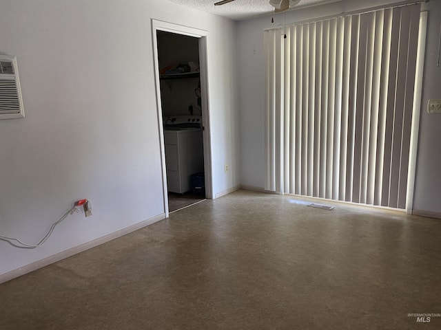 1472 En Casa Villa Dr, Mountain Home, ID 83647 - empty room featuring washer / clothes dryer, ceiling fan, and baseboards