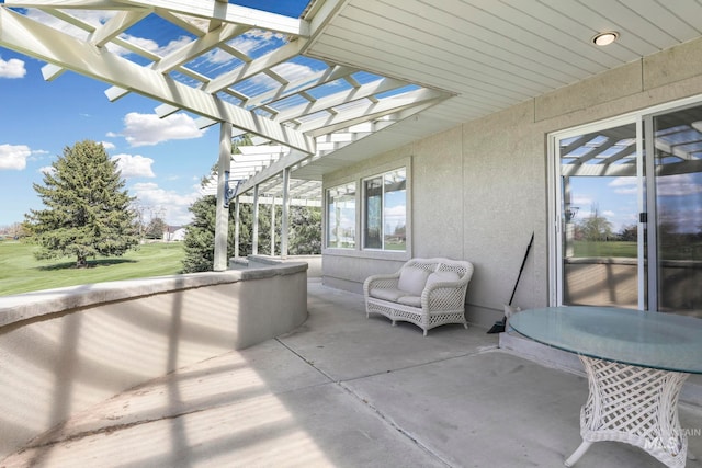 view of patio featuring a pergola