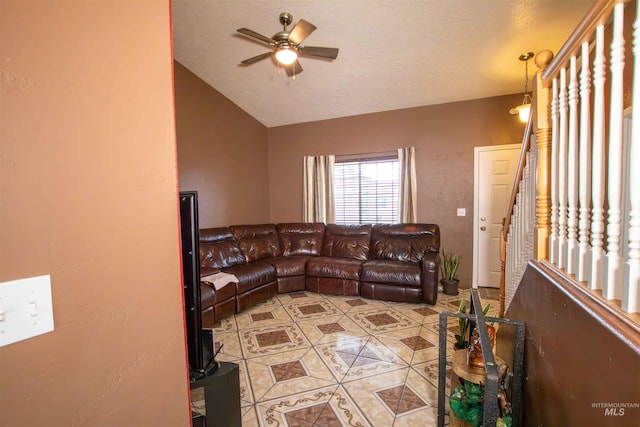 living room featuring lofted ceiling, light tile patterned floors, a textured ceiling, and ceiling fan