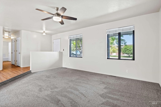1131 Aztec Dr, Twin Falls, ID 83301 - carpeted empty room with plenty of natural light, ceiling fan, and baseboards