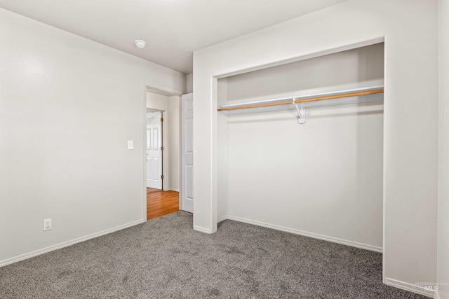 1131 Aztec Dr, Twin Falls, ID 83301 - unfurnished bedroom with carpet flooring, a closet, and baseboards