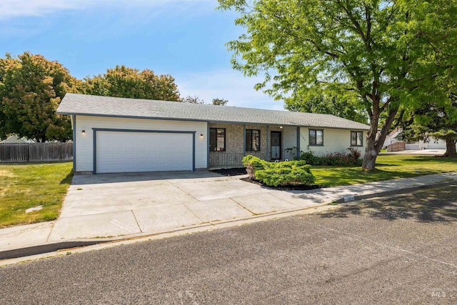1131 Aztec Dr, Twin Falls, ID 83301 - ranch-style home featuring an attached garage and concrete driveway