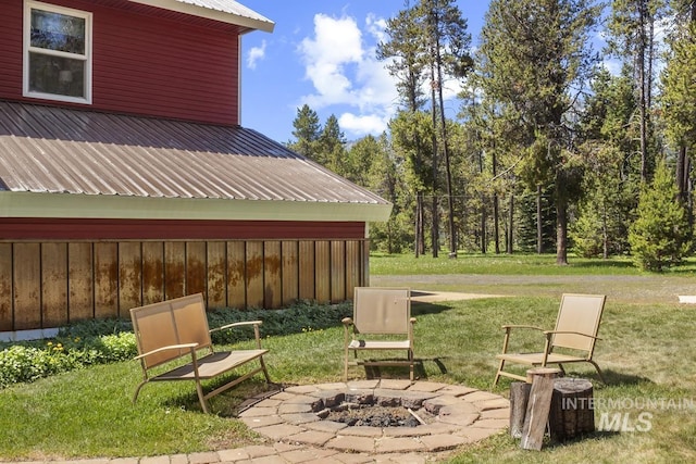 13098 Hillhouse Loop, Donnelly, ID 83615 - view of green lawn with an outdoor fire pit