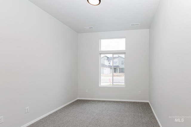 15414 Ivybridge Way, Nampa, ID 83651 - carpeted empty room featuring baseboards and visible vents