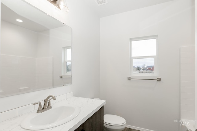 15414 Ivybridge Way, Nampa, ID 83651 - full bathroom with vanity, visible vents, and toilet