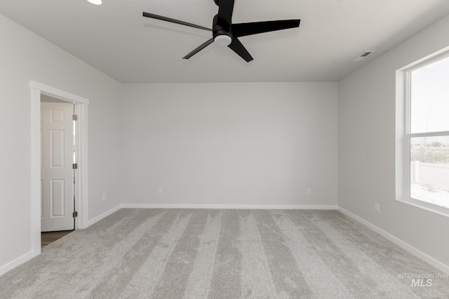 15414 Ivybridge Way, Nampa, ID 83651 - empty room featuring baseboards, a ceiling fan, and carpet