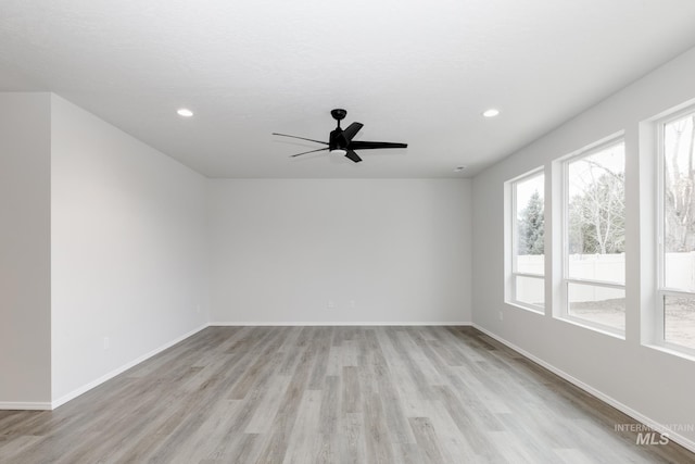 15414 Ivybridge Way, Nampa, ID 83651 - spare room with recessed lighting, light wood finished floors, baseboards, and ceiling fan
