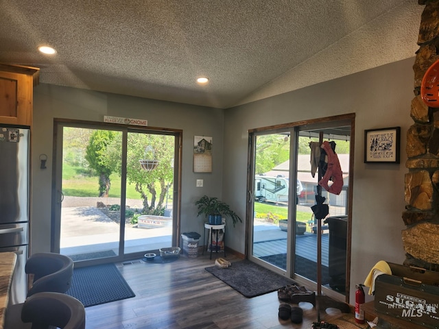 131 Beaver Nob Dr, Kamiah, ID 83536 - doorway with wood finished floors, a textured ceiling, recessed lighting, and baseboards