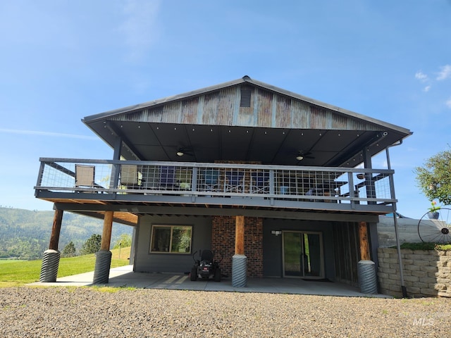 131 Beaver Nob Dr, Kamiah, ID 83536 - back of house featuring a ceiling fan, a patio, and a wooden deck